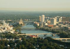 an aerial view of a city and river