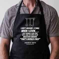 a man wearing an apron that says i don't measure a thing when i cook