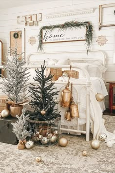 a bedroom decorated with christmas trees and ornaments