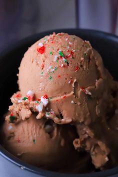 chocolate ice cream with sprinkles in a bowl