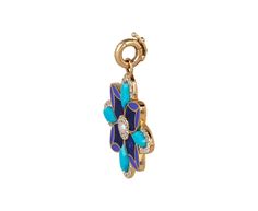 Add this vibrant Storrow charm pendant to any of your favorite chains for a touch of decadent whimsy. The 14K yellow gold violet is set with a geometric surface of turquoise, lapis and blue enamel inlay with a diamond frame. One small white pearl sits at the center surrounded by more diamonds for the perfect extra pop of sparkle. It hangs from the 14K yellow gold clasp, positioned to be a versatile addition to any chain bracelet or necklace. total length : 1 1/4"14K yellow gold charm : just unde Luxury Blue Locket Jewelry, Blue Fine Jewelry With Detachable Pendant, Yellow Gold Enamel Jewelry With Flower Charm, Luxury Blue Medallion Jewelry, Blue Jewelry With Detachable Round Pendant, Blue Jewelry With Detachable Pendant, Blue Hallmarked Medallion Jewelry, Blue Enamel Locket Jewelry, Enamel Pendant Jewelry With Flower Charm