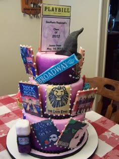 there is a cake that has been decorated with books