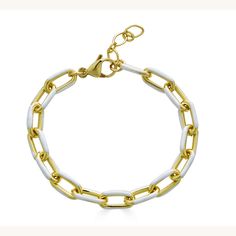 This ultra-mod chunky cable chain bracelet features pops of rich color, giving it a unique look of imaginative artistry with street style. A high-shine finish brings glamor to this statement bracelet, becoming the center of attention with any day or night wardrobe. An oversized lobster clasp and extension chain accommodate your best wrist size. Modern Gold-tone Chunky Chain Bracelet, Gold-plated Chunky Chain Bracelet With Oval Links, Gold-tone Chunky Chain Bracelets, Luxury Gold-tone Statement Chain Bracelet, Luxury Gold-tone Chunky Chain Bracelet, Statement Bracelet, Cable Chain, Chain Bracelet, Precious Metals