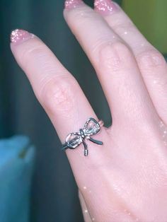 𝔇𝔢𝔱𝔞𝔦𝔩𝔰 Style: Y2k, Coquette, Kawaii Materials: Metal Quantity: 2 pcs(set) Elevate your style with our Coquette Basic Ribbon Rings Set - an embodiment of simple yet classic beauty. Whether it's a casual day out or a special occasion, these cute ribbon rings effortlessly enhance your look with their delicate design. Enjoy free shipping with a purchase of over 80$ Coquette Kawaii, Ribbon Ring, Cute Ribbon, Y2k Coquette, Delicate Design, Rings Set, Classic Beauty, Days Out, Opal Rings