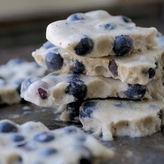 a pile of blueberry shortbreads sitting on top of a table