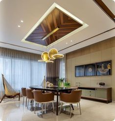 an elegant dining room with modern furniture and lighting