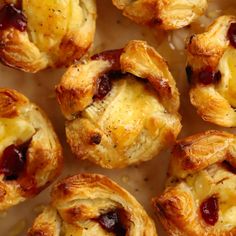 baked pastries with cranberry sauce and cheese