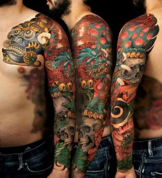 two men with tattoos on their arms