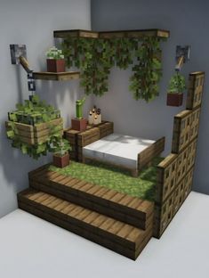 a bed and some shelves in a room with plants on the wall, and a planter hanging from the ceiling