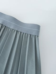 This Pleated Skirt in Slate Blue features a flattering 37 inch length. The pleated design adds dimension to your look, while the rich color adds a touch of sophistication. Solid Pleated Skirt With Stretch, Solid Stretch Pleated Skirt, Spring Solid Color Pleated Skirt With Elastic Waistband, Solid Stretch Pleated Skirt With Pleated Hem, Pleated Stretch Skirt With Pleated Hem, Solid Pleated Skirt With Elastic Waistband For Spring, Stretch Pleated Midi Skirt, Elegant Blue Skirt With Elastic Waistband, Classic Pleated Stretch Bottoms