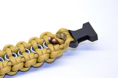 a close up of a paracording cord on a white background with clippings