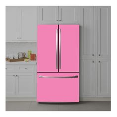 a pink refrigerator freezer sitting in a kitchen