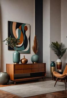 a living room filled with lots of furniture and art on the wall next to a painting