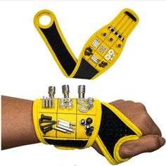 a yellow wrist brace with tools on it