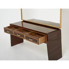 a wooden desk with two drawers and a mirror