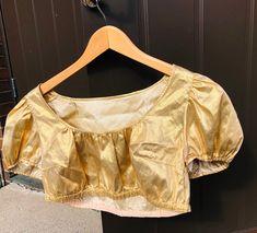 0s top Gold puffy sleeved metallic cropped top blouse siZe xs s  Nonstretchy material Condition good Measurements bust 51 cm x2 lenght front neckline to hem 17cm (to underbust)  sleeve 21 cm sleeve circumference 30cm  12 inches Gold Padded Blouse For Festivals, Festive Gold Padded Blouse, Gold Stretch Crop Top, Vintage Gold Crew Neck Top, Vintage Gold Long Sleeve Blouse, 70s Tops, Cropped Top, Finland, Top Blouse