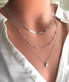 Silver Chain Necklace For Layering, Silver Chain Necklace With Adjustable Chain For Layering, Silver Minimalist Layered Necklace With Double Chain, Silver Clavicle Chain Necklace For Layering, Silver Snake Chain Necklace For Layering, Silver Dainty Chain Necklace For Layering, Silver Double Strand Delicate Chain Necklace, Silver Double Strand Chain Necklace For Everyday, Everyday Silver Double Strand Chain Necklace