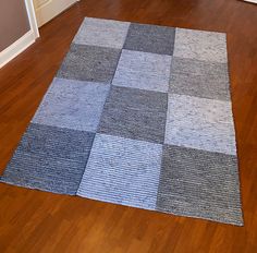 an area rug on the floor in a house