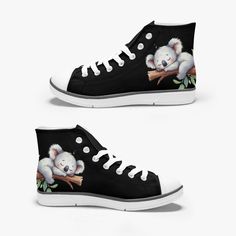 black and white high top shoes with koalas on the front, side and back