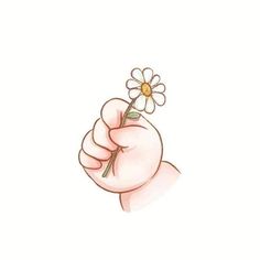 a hand holding a flower in the middle of it's thumb and pointing at it