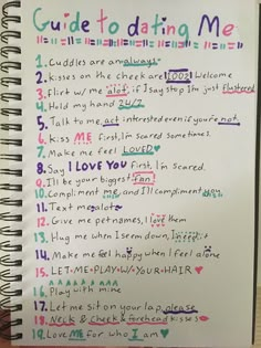 a spiral notebook with writing on it that says guide to dating me in different languages