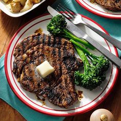 two plates with steak, broccoli and potatoes on them