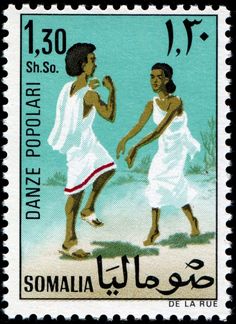 a postage stamp with two women in white dresses and one is holding the hand of another woman