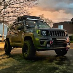 the jeep is parked on the side of the road