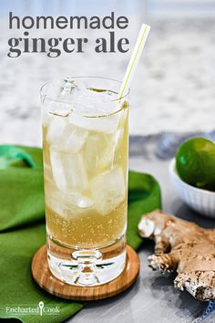 a drink with ginger ale and limes on the side