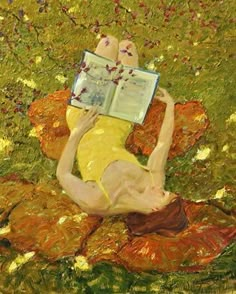 a painting of a woman laying on the ground reading a book