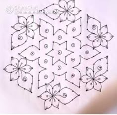 an image of a circular design with flowers on it