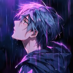 a man with blue hair standing in the rain