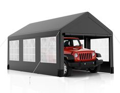 a red jeep is parked in front of a black tent with windows on the side