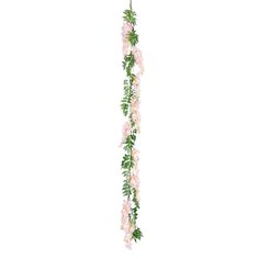 pink flowers and green leaves are hanging from the side of a long branch on a white background