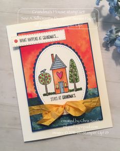 a handmade card with an image of a house and trees on it, which reads what happens at grandma's