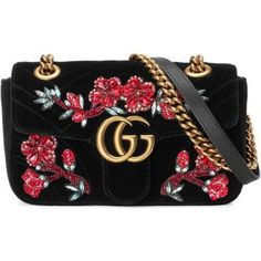 Description The mini GG Marmont chain shoulder bag has a softly structured shape and an oversized flap closure with Double G hardware. This pink velvet GG Marmont embroidered bag from Gucci is exquisitely feminine. This striking piece has been fashioned from black silk-velvet adorned with the label’s signature embroidered multi-colored blooms. The sliding chain strap can be multiple ways, changing between a shoulder and a top handle bag. Made in embroidered chevron velvet with a heart on the bac Chevron Purse, Oversized Handbags, Oversized Purse, Sequin Handbag, Man Shoulder, Handbags Gucci, Cl Fashion, Structured Handbags, Sequin Purse