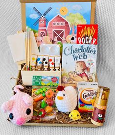 a basket filled with lots of toys and books