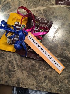 some candy bars are tied up on a table