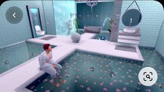 a woman sitting on the edge of a pool in a bathroom