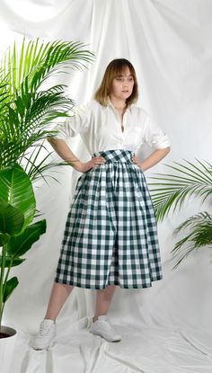 "Forest Green check high waist full gathered skirt. Perfect for casual outfits and special ocasions with pair of trainters or high heels. 100% cotton.  Elastic at the back of waist.  Two side pockets. Midi lenght about 70cm + 5 cm waistband. Handmade in UK.  Model wears size S.  HOW TO CHOOSE A SIZE ?   Using a measuring tape, measure the smallest part of your waist.  SIZE CHART: (CM) XS - W: 66 CM S - W: 70 CM M - W: 74 CM  L - W: 78 CM  XL - W: 82 CM  CARE INSTRUCTIONS: Hand wash only, do not bleach, hang dry, do not tumble dry, press with a cool iron on the reverse side.  Please message me before purchasing so I can check availability. If you wish this skirt in any other fabric, shorter or longer \"send message to seller\" and we can try to make something especially for you. *Depends on Plaid Cotton Lined Skirt Bottoms, Fitted Cotton Skirt For Picnic, Plaid Cotton Long Skirt, Plaid Long Cotton Skirt, Plaid Cotton Relaxed Skirt, Long Plaid Cotton Skirt, Classic Cotton Midi-length Bottoms, Classic Midi Length Cotton Bottoms, Spring Gingham Cotton Skirt