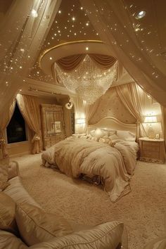 a large bed sitting in the middle of a bedroom next to a chandelier