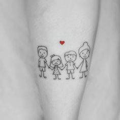 a small family tattoo on the left inner arm, with a red heart in the center