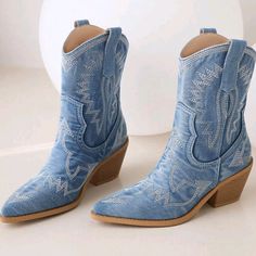 Womens Blueembroidered Western Cowboy Mid-Calf Chunky Heel Pull-Up Tabs Classic Cowgirl Boots Eyelet Embroidery Slip-On Low Heel Upper Material: Fabric Outsole Material: Rubber Blue Western Boots For Summer, Blue Denim Winter Boots, Light Blue Boots For Fall, Blue Embroidered Boots For Spring, Blue Embroidered Spring Boots, Classic Cowgirl, Eyelet Embroidery, Pull Up, Cowgirl Boots