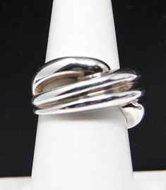 A very nice solid ring at 5.21 dwt. A very different pattern which is very attractive. Tapers down from 12mm's. See very few rings in pure silver. Has 2 emblems and .999. Very slight wear. Stackable Rings, Different Patterns, Pure Silver, Favorite Jewelry, Silver Ring, Jewelry Rings, Silver Rings, Accessory Gift, Size 6