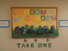 there is a sign that says, gondom garden take one and three little train cars