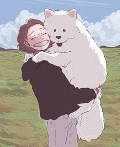 a woman hugging a large white dog in a field