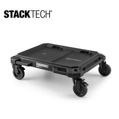 a black plastic dolly cart with wheels and casteors on the bottom, sitting against a white background