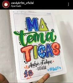 someone holding up a notebook with the words ma tema tica's written on it