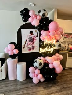 a birthday party with balloons and decorations