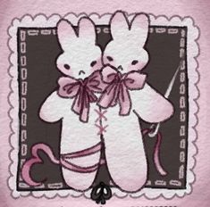 an image of two bunnies holding each other